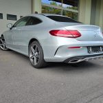 Mercedes C200 Coupé gris vu de trois quarts arrière
